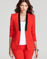 Embrace modern design as clean lines and block colors combine for a sleek VINCE CAMUTO blazer. Style with skinny pants for a chic, structured silhouette. Embrace modern design as clean lines and block colors combine for a sleek VINCE CAMUTO blazer. Style with skinny pants for a chic, structured silhouette.
