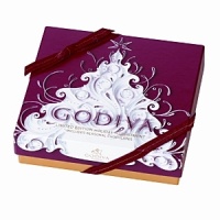 Celebrate the holidays with an assortment of decadent Godiva chocolates packaged in a whimiscal-themed red box. The 9 piece classic Belgian chocolate assortment includes everyday and limited edition seasonal truffles. Celebrate the holidays with an assortment of decadent Godiva chocolates packaged in a whimiscal-themed red box. The 9 piece classic Belgian chocolate assortment includes everyday and limited edition seasonal truffles.