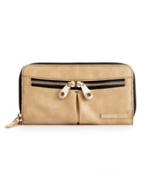 Mega-shine hardware adds glam appeal to this refined design from Kenneth Cole Reaction. This zip-around style features a double zip front pocket and plenty of interior organization. Mega-shine hardware adds glam appeal to this refined design from Kenneth Cole Reaction. This zip-around style features a double zip front pocket and plenty of interior organization.