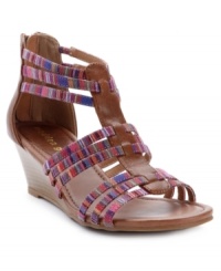 Packed schedule? Keep it cute as you get it all done. Madden Girl's Bizzy sandals feature colorful fabric straps, a trendy back zipper and a contrasting walkable wedge. Packed schedule? Keep it cute as you get it all done. Madden Girl's Bizzy sandals feature colorful fabric straps, a trendy back zipper and a contrasting walkable wedge.