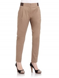 THE LOOKElastic waistband Front zip and hook closurePleated frontSide seam pocketsSkinny legCuffed hemBack mock pocketsTHE FITRise, about 11Inseam, about 26THE MATERIALCotton/polyurethaneCARE & ORIGINDry cleanImportedModel shown is 5'10 (177cm) wearing US size 4. THE LOOKElastic waistband Front zip and hook closurePleated frontSide seam pocketsSkinny legCuffed hemBack mock pocketsTHE FITRise, about 11Inseam, about 26THE MATERIALCotton/polyurethaneCARE & ORIGINDry cleanImportedModel shown is 5'10 (177cm) wearing US size 4.
