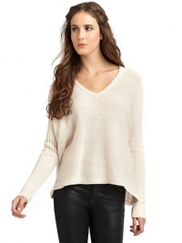 THE LOOKRibbed knit sleevesHi-lo hemTHE FITAbout 26 from shoulder to hemTHE MATERIALWool/cashmereCARE & ORIGINDry cleanImportedModel shown is 5'8 (172½cm) wearing US size Small. THE LOOKRibbed knit sleevesHi-lo hemTHE FITAbout 26 from shoulder to hemTHE MATERIALWool/cashmereCARE & ORIGINDry cleanImportedModel shown is 5'8 (172½cm) wearing US size Small.