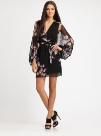 A painterly butterfly print decorates this soft, silk chiffon style.Surplice necklineSheer, split blouson sleevesWrap frontSilk liningAbout 18 from natural waistSilkDry cleanImportedModel shown is 5'10½ (179cm) wearing US size 4. A painterly butterfly print decorates this soft, silk chiffon style.Surplice necklineSheer, split blouson sleevesWrap frontSilk liningAbout 18 from natural waistSilkDry cleanImportedModel shown is 5'10½ (179cm) wearing US size 4.
