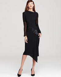 Reveal an edge of sophistication with this chic DIANE von FURSTENBERG dress that features sheer and leather panels with a chic asymmetric hem. Reveal an edge of sophistication with this chic DIANE von FURSTENBERG dress that features sheer and leather panels with a chic asymmetric hem.