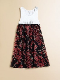 Casual meets classy on this eye-catching frock that marries a basic tank with a frilly, floral chiffon skirt with ruffled waistband.ScoopneckSleevelessPullover styleElastic waistbandHand washImported Casual meets classy on this eye-catching frock that marries a basic tank with a frilly, floral chiffon skirt with ruffled waistband.ScoopneckSleevelessPullover styleElastic waistbandHand washImported