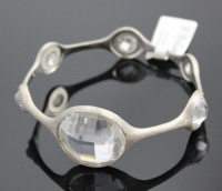 B. Brilliant Brushed Sterling Silver Bangle Bracelet with Large Checkerboard Cut Cubic Zirconia B. Brilliant Brushed Sterling Silver Bangle Bracelet with Large Checkerboard Cut Cubic Zirconia