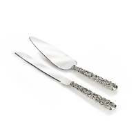 The couture designer Monique Lhuillier celebrates her first creative collaboration with Waterford Crystal with the Sunday Rose Collection. Inspired by her iconic Sunday Rose wedding gown, this formal cake knife & server set lets you serve dessert with classic sophistication. The couture designer Monique Lhuillier celebrates her first creative collaboration with Waterford Crystal with the Sunday Rose Collection. Inspired by her iconic Sunday Rose wedding gown, this formal cake knife & server set lets you serve dessert with classic sophistication.