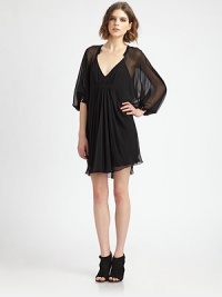 Flouncy silk drapes beautifully around the body in this utterly-romantic silhouette.Collar band V neckline Dropped shoulders Three-quarter sleeves Ruched bust Gathered bodice Asymmetrical hem Gathered back About 23 from natural waist Silk Dry clean ImportedOUR FIT MODEL RECOMMENDS ordering one size down as this style runs large. Flouncy silk drapes beautifully around the body in this utterly-romantic silhouette.Collar band V neckline Dropped shoulders Three-quarter sleeves Ruched bust Gathered bodice Asymmetrical hem Gathered back About 23 from natural waist Silk Dry clean ImportedOUR FIT MODEL RECOMMENDS ordering one size down as this style runs large.