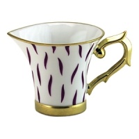 Frivole combines daring originality with soft feminity to create a sophisticated design for the table. Sprawling leaf-work designs add exuberant elegance to this whimsical pattern. Coordinating colors of amethyst and sage with gold trim allow versatility when entertaining formally or casually. Frivole combines daring originality with soft feminity to create a sophisticated design for the table. Sprawling leaf-work designs add exuberant elegance to this whimsical pattern. Coordinating colors of amethyst and sage with gold trim allow versatility when entertaining formally or casually.