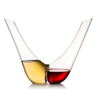 Carefully mouth blown and crafted by hand, Rogaska's Duo Decanter is the first of its kind, offering an ingenious option for serving multiple wines in chic, modern style. Carefully mouth blown and crafted by hand, Rogaska's Duo Decanter is the first of its kind, offering an ingenious option for serving multiple wines in chic, modern style.