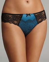 Chic and ladylike, Chantelle's tanga features a no-show lace waistband for flawless wear under figure-hugging ensembles. Style #1939. Chic and ladylike, Chantelle's tanga features a no-show lace waistband for flawless wear under figure-hugging ensembles. Style #1939.