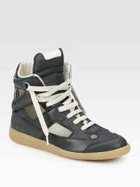 Sporty leather classic modernized by a trend-forward high top and cutout design. Leather upperLeather liningRubber solePadded insoleMade in ItalyOUR FIT MODEL RECOMMENDS ordering one half size up as this style runs small. Sporty leather classic modernized by a trend-forward high top and cutout design. Leather upperLeather liningRubber solePadded insoleMade in ItalyOUR FIT MODEL RECOMMENDS ordering one half size up as this style runs small.
