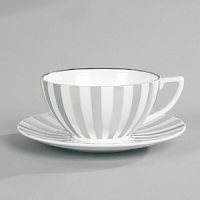 Jasper Conran continues to close the gap between formal dining and casual living. He accents the contemporary beauty of his already popular white bone china range with a touch of formality in the forum of a thin platinum band. To create an interplay of proportions, accent pieces including a plate, a charger, a small pitcher, mug, teacup and saucer, use thick platinum stripes to reinforce the pattern's look of sophisticated elegance. Jasper Conran continues to close the gap between formal dining and casual living. He accents the contemporary beauty of his already popular white bone china range with a touch of formality in the forum of a thin platinum band. To create an interplay of proportions, accent pieces including a plate, a charger, a small pitcher, mug, teacup and saucer, use thick platinum stripes to reinforce the pattern's look of sophisticated elegance.