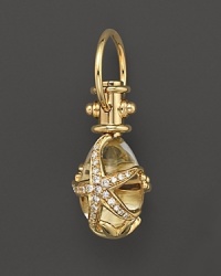 18K yellow gold starfish amulet with diamond and crystal pavé from Temple St. Clair. 18K yellow gold starfish amulet with diamond and crystal pavé from Temple St. Clair.