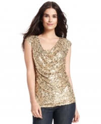 Give your favorite jeans some extra sparkle with this sequined top from MICHAEL Michael Kors. A stylish cowl neckline and cap sleeves create a flirty feel. Give your favorite jeans some extra sparkle with this sequined top from MICHAEL Michael Kors. A stylish cowl neckline and cap sleeves create a flirty feel.