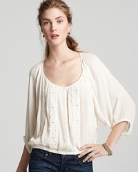Articulated in an elegantly billowy silhouette, this Ella Moss top is decorated with delicate lace insets for vintage-inspired romance. Articulated in an elegantly billowy silhouette, this Ella Moss top is decorated with delicate lace insets for vintage-inspired romance.