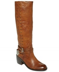 Leather-covered studs line the shaft of Donald Pliner's Bara tall boots, creating a rugged, yet decorated look. A metal plate covers the heel, providing additional shine. Leather-covered studs line the shaft of Donald Pliner's Bara tall boots, creating a rugged, yet decorated look. A metal plate covers the heel, providing additional shine.