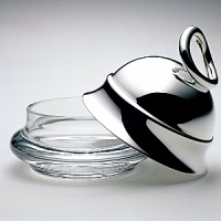 Vertigo table accessories are modern pieces for your table designed with a combination of silver holloware and crystal bases. Vertigo table accessories are a perfect compliment to other Vertigo pieces including: coffee service; barware; trays; open vegetable dish; and 3-part hors d'oeuvre server. Shown here is the Vertigo butter dish. Also available is a gravy boat; 4 part condiment set with tray; set of 4 knife rests ; salt & pepper; and jam jar. Vertigo table accessories are modern pieces for your table designed with a combination of silver holloware and crystal bases. Vertigo table accessories are a perfect compliment to other Vertigo pieces including: coffee service; barware; trays; open vegetable dish; and 3-part hors d'oeuvre server. Shown here is the Vertigo butter dish. Also available is a gravy boat; 4 part condiment set with tray; set of 4 knife rests ; salt & pepper; and jam jar.