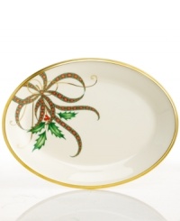 A mixture of Lenox's Holiday holly motif and their classic Christmas plaid ribbon creates an elegant design upon this wide oval serving platter from the holiday dinnerware and dishes collection. Scrolling accents and a rim of 24-karat gold finish the look with lasting grace. A mixture of Lenox's Holiday holly motif and their classic Christmas plaid ribbon creates an elegant design upon this wide oval serving platter from the holiday dinnerware and dishes collection. Scrolling accents and a rim of 24-karat gold finish the look with lasting grace.