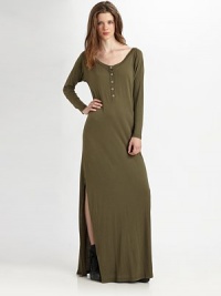 Cotton-blend scoopneck with long dolman sleeves and a sassy side slit. ScoopneckLong sleevesButton frontSide slitAbout 44 from natural waist50% cotton/50% modal Machine washMade in USAModel shown is 5'9½ (176cm) wearing US size Small. Cotton-blend scoopneck with long dolman sleeves and a sassy side slit. ScoopneckLong sleevesButton frontSide slitAbout 44 from natural waist50% cotton/50% modal Machine washMade in USAModel shown is 5'9½ (176cm) wearing US size Small.
