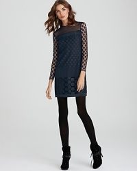 Feminine but not girly, this DIANE von FURSTENBERG dress puts a modern spin on retro polka dots, adding a drop waist with crochet detail and chic sheer sleeves. Edge up the look with opaque tights and spiky lace-up booties. Feminine but not girly, this DIANE von FURSTENBERG dress puts a modern spin on retro polka dots, adding a drop waist with crochet detail and chic sheer sleeves. Edge up the look with opaque tights and spiky lace-up booties.