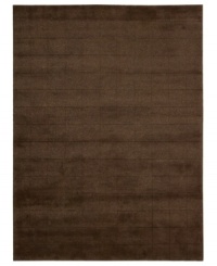 Skilled hand-carving creates an absorbing geometric block pattern on this premium Nourison area rug. Crafted with the timeless art of Tibetan hand-knotting, this deep brown piece features a soft blend of wool and Luxcelle fibers for a distinctive, satiny texture and sheen. (Clearance) Skilled hand-carving creates an absorbing geometric block pattern on this premium Nourison area rug. Crafted with the timeless art of Tibetan hand-knotting, this deep brown piece features a soft blend of wool and Luxcelle fibers for a distinctive, satiny texture and sheen. (Clearance)