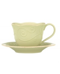 With fanciful beading and a feminine edge, this Lenox French Perle cup and saucer set has an irresistibly old-fashioned sensibility. Hardwearing stoneware is dishwasher safe and, in a soft pistachio hue with antiqued trim, a graceful addition to any meal.