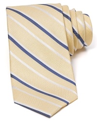 Diagonal stripes dash across a textured silk tie from The Men's Store at Bloomingdale's. Diagonal stripes dash across a textured silk tie from The Men's Store at Bloomingdale's.