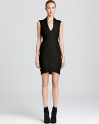 Flaunt futuristic style with this sleek, structured Helmut Lang sleeveless dress boasting a deep v neck and exposed back zip. Flaunt futuristic style with this sleek, structured Helmut Lang sleeveless dress boasting a deep v neck and exposed back zip.