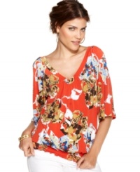 Style&co.'s sizzling new take on the classic peasant top features a bold print, bright color and a unique V-neckline in front and back! Style&co.'s sizzling new take on the classic peasant top features a bold print, bright color and a unique V-neckline in front and back!