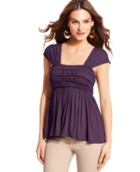 A goddess-inspired cut gives this flirty top from Studio M a soft, romantic feel. Pair it with your favorite pieces for a thoroughly modern look. A goddess-inspired cut gives this flirty top from Studio M a soft, romantic feel. Pair it with your favorite pieces for a thoroughly modern look.