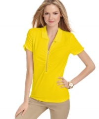 The traditionally preppy polo gets a chic edge for spring with this MICHAEL Michael Kors top, featuring an exposed zipper trim and ruching! The traditionally preppy polo gets a chic edge for spring with this MICHAEL Michael Kors top, featuring an exposed zipper trim and ruching!
