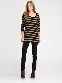 Striped boyfriend sweater complemented by a zippered chest detail and a contour hem that hits below the hips. RoundneckDropped shouldersLong sleevesZippered chest detailContour hem hits below the hipsRayon/spandexDry cleanMade in USAModel shown is 5'10 (177cm) wearing US size Small. Striped boyfriend sweater complemented by a zippered chest detail and a contour hem that hits below the hips. RoundneckDropped shouldersLong sleevesZippered chest detailContour hem hits below the hipsRayon/spandexDry cleanMade in USAModel shown is 5'10 (177cm) wearing US size Small.