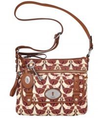 Bursting with a personality all its own, this printed design from Fossil will put you in the style spotlight. A convenient top zip design with a place for everything. Silver-tone hardware and signature charms complete the look. Bursting with a personality all its own, this printed design from Fossil will put you in the style spotlight. A convenient top zip design with a place for everything. Silver-tone hardware and signature charms complete the look.