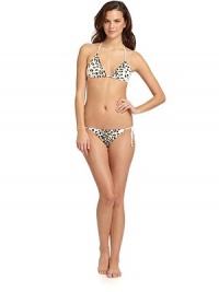 THE LOOKAllover leopard print with golden sequinsHalter straps tie at neckAdjustable padded triangle cupsBack tie closure with bead accentsTHE MATERIAL87% nylon/13% spandexFully linedCARE & ORIGINHand washImportedPlease note: Bikini bottom sold separately. 