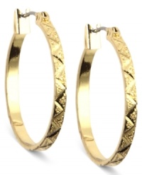 Patterned pizzazz. This set of hoop earrings from Anne Klein is crafted from gold-tone mixed metal and features etchings along the outside for a stylish touch. Approximate diameter: 3/4 inch. Patterned pizzazz. This set of hoop earrings from Anne Klein is crafted from gold-tone mixed metal and features etchings along the outside for a stylish touch. Approximate diameter: 3/4 inch.