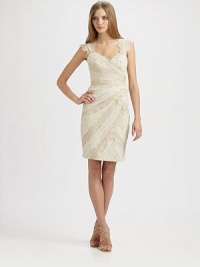 Artfully constructed of ruched tulle panels, trimmed with bands of lace for an ultra-feminine effect.Cap sleevesSurplice sweetheart necklineBack cutout detailFully linedConcealed back zipAbout 23 from natural waistPolyesterDry cleanImportedModel shown is 5'10 (177cm) wearing US size 4. Artfully constructed of ruched tulle panels, trimmed with bands of lace for an ultra-feminine effect.Cap sleevesSurplice sweetheart necklineBack cutout detailFully linedConcealed back zipAbout 23 from natural waistPolyesterDry cleanImportedModel shown is 5'10 (177cm) wearing US size 4.