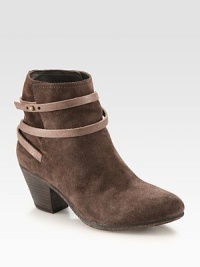 Adjustable leather strap wraps around this butter-soft suede ankle boot while a stacked heel adds a touch of height. Stacked heel, 2½ (65mm)Suede and leather upperLeather lining and solePadded insoleImported Adjustable leather strap wraps around this butter-soft suede ankle boot while a stacked heel adds a touch of height. Stacked heel, 2½ (65mm)Suede and leather upperLeather lining and solePadded insoleImported