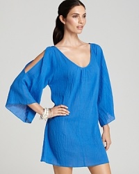 Give them the cold shoulder with this cotton coverup from Debbie Katz. Post-plunge, this tunic perfects a low-key lounge look. Give them the cold shoulder with this cotton coverup from Debbie Katz. Post-plunge, this tunic perfects a low-key lounge look.