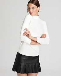 A closet essential, this sleek RAOUL turtleneck is crafted with a hint of stretch for a flawless silhouette. A closet essential, this sleek RAOUL turtleneck is crafted with a hint of stretch for a flawless silhouette.