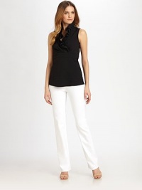 Feminine and flirty, a sleeveless design made from fine Italian fabrication and featuring romantic ruffle details.Ruffle necklineSleevelessEmpire waistPrincess seamsSide zipperAbout 25 from shoulder to hem72% cotton/23% polyamide/5% Lycra®Machine washImported of Italian fabric Model shown is 5'10 (177cm) wearing US size Small. Feminine and flirty, a sleeveless design made from fine Italian fabrication and featuring romantic ruffle details.Ruffle necklineSleevelessEmpire waistPrincess seamsSide zipperAbout 25 from shoulder to hem72% cotton/23% polyamide/5% Lycra®Machine washImported of Italian fabric Model shown is 5'10 (177cm) wearing US size Small.