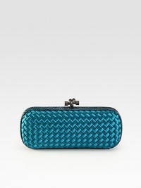 This long design features smooth satin in an elegant woven pattern accented with python detail and unique knot detailed closure.Top clasp closureSatin lining10W X 4¼H X ¾DMade in Italy This long design features smooth satin in an elegant woven pattern accented with python detail and unique knot detailed closure.Top clasp closureSatin lining10W X 4¼H X ¾DMade in Italy