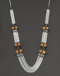 Gleaming sterling silver and bamboo mix for a stunning combination of luxurious and organic. By Gucci. Gleaming sterling silver and bamboo mix for a stunning combination of luxurious and organic. By Gucci.