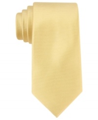 One bold stroke. Make a singular style statement with this solid skinny tie from Tommy Hilfiger. One bold stroke. Make a singular style statement with this solid skinny tie from Tommy Hilfiger.