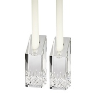 Updated with striking shapes, these candlesticks retain the classic details of the iconic Waterford Lismore pattern for an alluring display of crystal and candlelight. Updated with striking shapes, these candlesticks retain the classic details of the iconic Waterford Lismore pattern for an alluring display of crystal and candlelight.