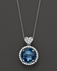 Blue topaz and diamond pendant necklace in white gold with signature heart bail from Lisa Nik's Rocks collection. Blue topaz and diamond pendant necklace in white gold with signature heart bail from Lisa Nik's Rocks collection.