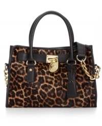 MICHAEL Michael Kors gives the ladylike satchel an edgy update with leopard print haircalf, stud accents and signature hardware. But don't let this silhouette's luxe look fool you: it's roomy, pocket-trimmed interior perfects practical style. MICHAEL Michael Kors gives the ladylike satchel an edgy update with leopard print haircalf, stud accents and signature hardware. But don't let this silhouette's luxe look fool you: it's roomy, pocket-trimmed interior perfects practical style.