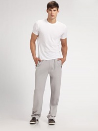 Lightweight ease for a morning jog or midday errand, styled with an elastic waist and zippered pockets. Elastic waistband Logo embroidery Side zip pockets Inseam, about 30 52% cotton/48% polyester Machine wash Imported Lightweight ease for a morning jog or midday errand, styled with an elastic waist and zippered pockets. Elastic waistband Logo embroidery Side zip pockets Inseam, about 30 52% cotton/48% polyester Machine wash Imported