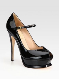 Ultimate feminine peep toe silhouette of shiny patent leather, with a towering heel and adjustable ankle strap. Self-covered heel, 5½ (140mm)Island platform, 1¼ (30mm)Compares to a 4¼ heel (110mm)Patent leather upperPeep toeLeather lining and solePadded insoleMade in ItalyOUR FIT MODEL RECOMMENDS ordering one size up as this style runs small. Ultimate feminine peep toe silhouette of shiny patent leather, with a towering heel and adjustable ankle strap. Self-covered heel, 5½ (140mm)Island platform, 1¼ (30mm)Compares to a 4¼ heel (110mm)Patent leather upperPeep toeLeather lining and solePadded insoleMade in ItalyOUR FIT MODEL RECOMMENDS ordering one size up as this style runs small.