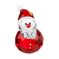 This sparkling crystal Santa figurine from Swarovski has a specially designed base that lets him gently rock back and forth. This sparkling crystal Santa figurine from Swarovski has a specially designed base that lets him gently rock back and forth.